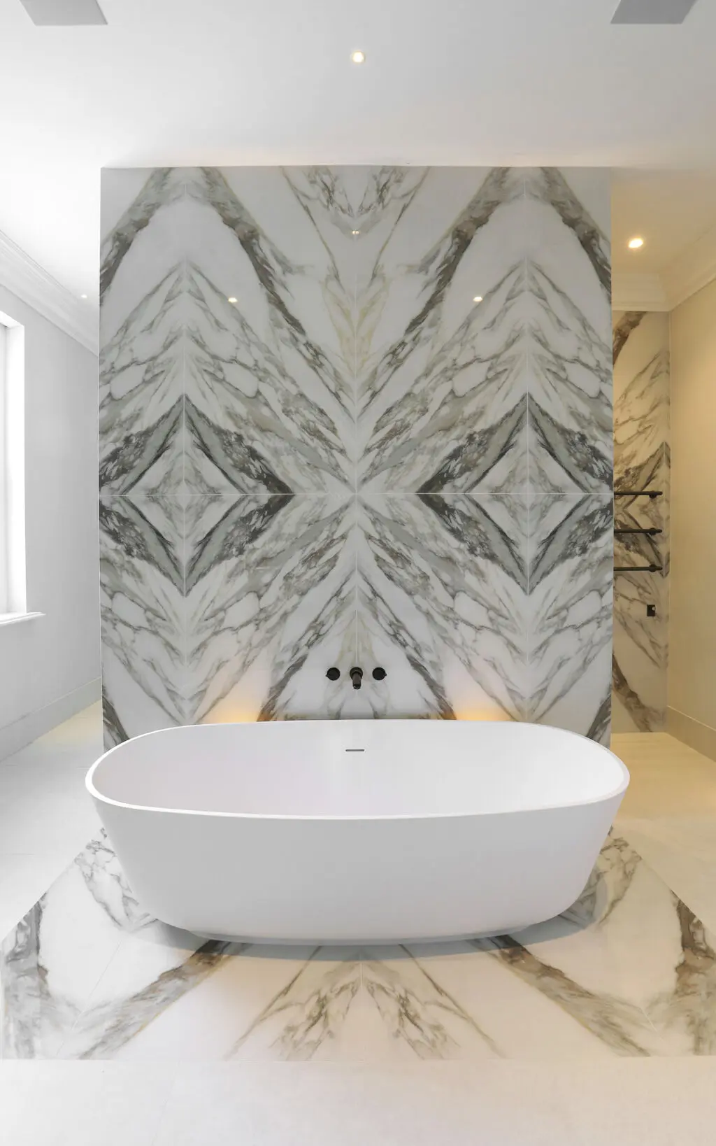 Bathroom feature with Samuel Heath Xenon bath tap in City Bronze