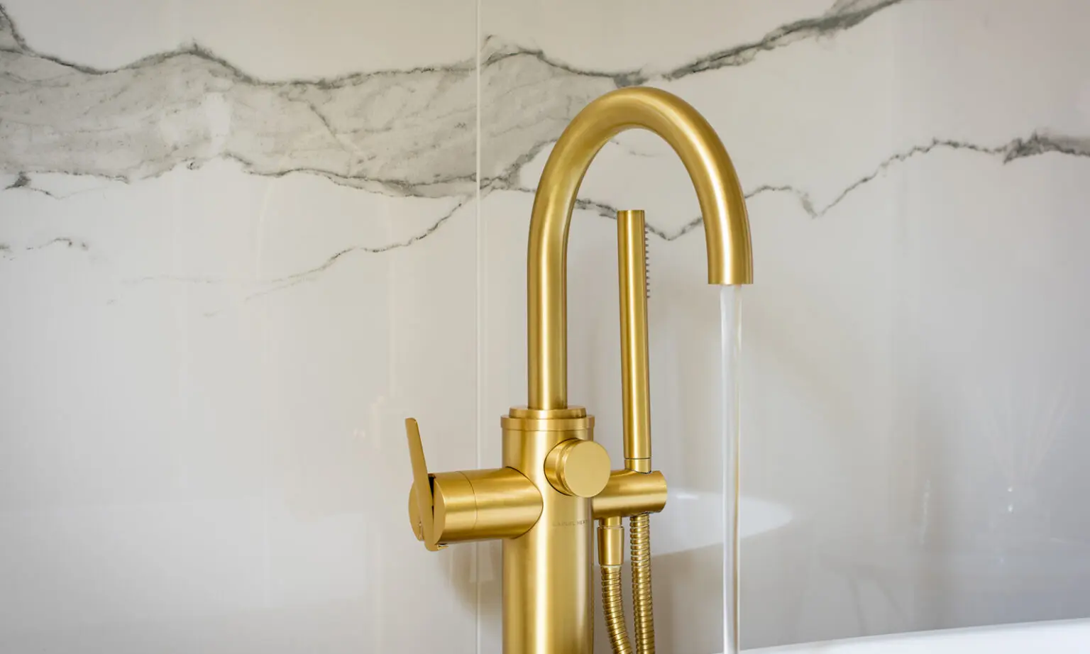 SGS Interiors Georgian style home with Samuel Heath bathroom with Classic Forme Bath Filler close up in Brushed Gold Matt