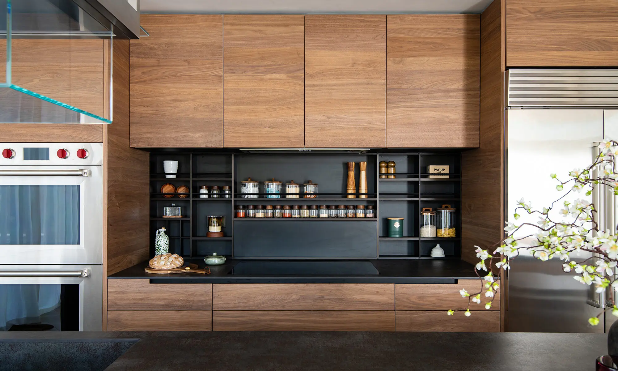 Open plan kitchen with bespoke wood cabinetry