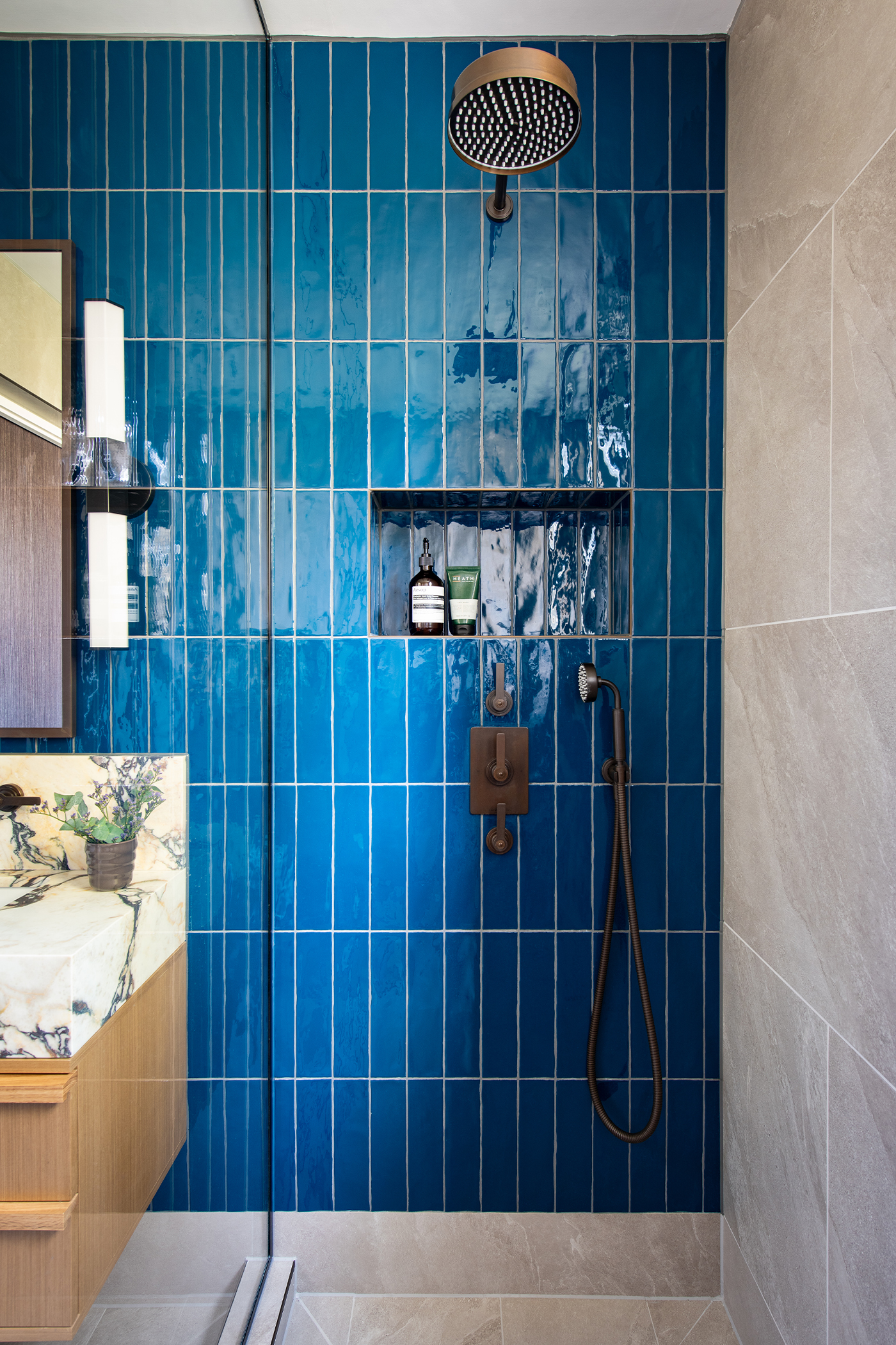 Principal ensuite shower with deep blue tiles and Landmark Pure concealed shower Samuel Heath