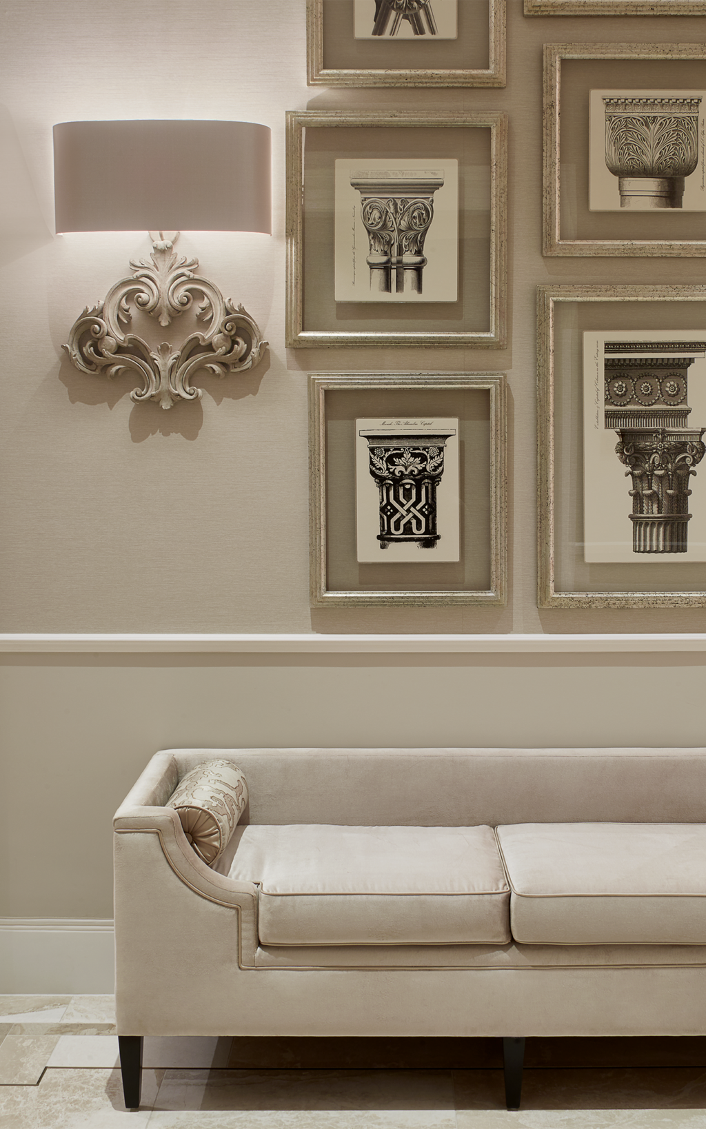 neutral tone sofa and artwork